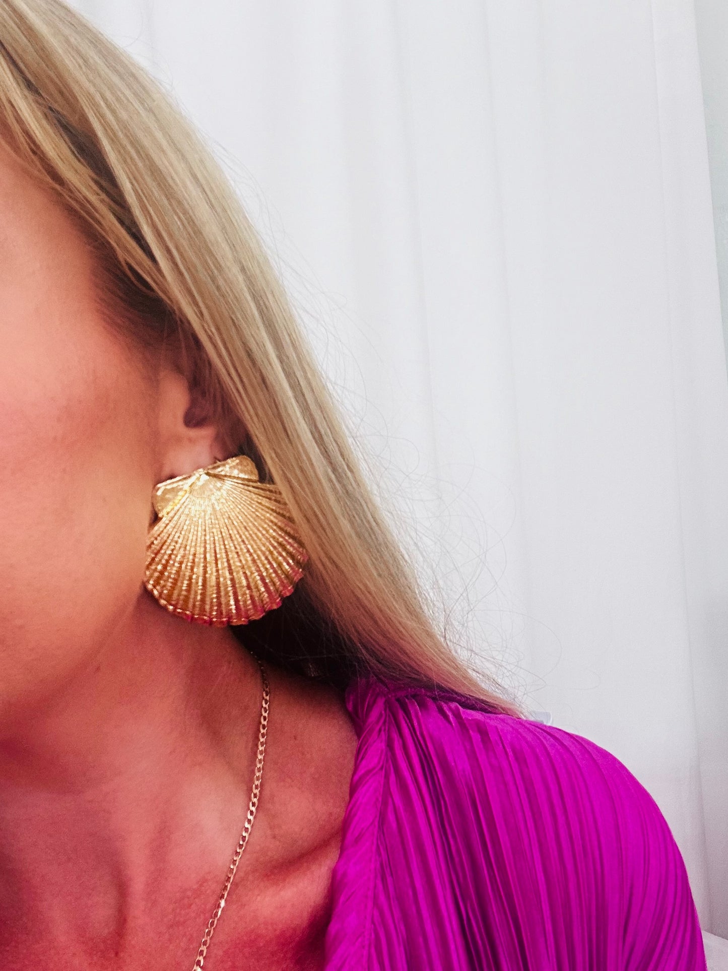 Jumbo gold shell earrings