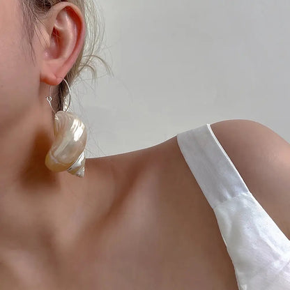 Mermaids are real conch earrings