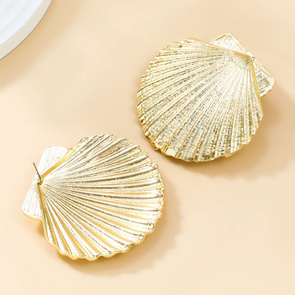 Jumbo gold shell earrings